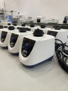 Multiple AELAB AVT-501 vortex mixers arranged on a laboratory bench in angled front view