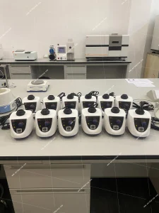 Multiple AELAB AVT-501 vortex mixers displayed from the front on a laboratory workbench
