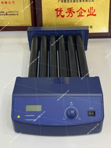 Top view of MX-T6-Pro tube roller showing LCD display and speed/timer control