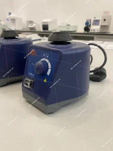 AELAB MX-S variable speed vortex mixer angled front view with speed knob and operating switch